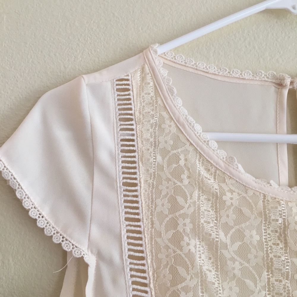 Romper with intricate flower detailing